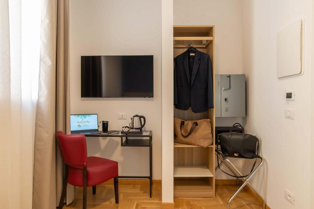 TV a/nebo společenská místnost v ubytování Essence Collection Hotel