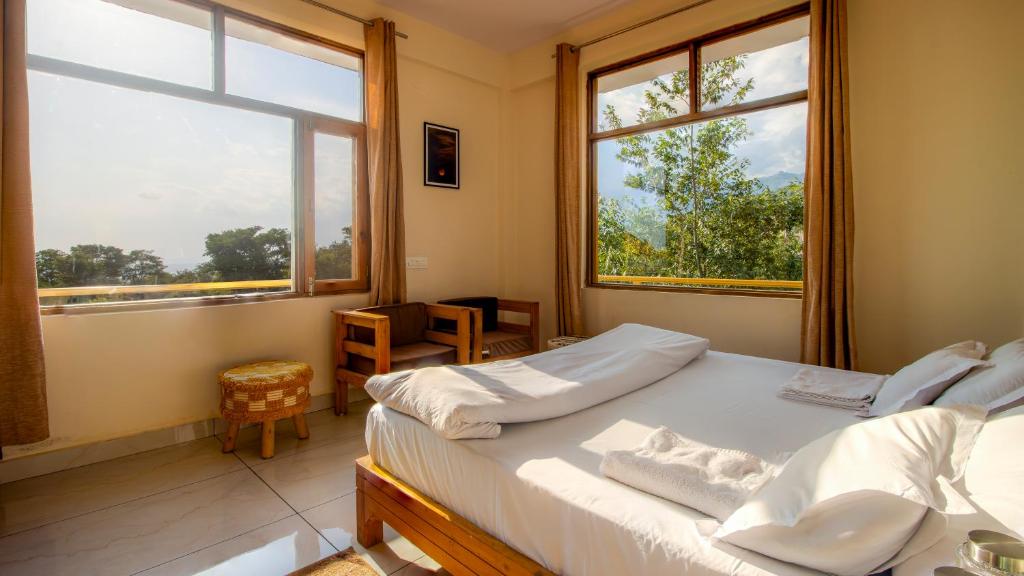 Postel nebo postele na pokoji v ubytování Dormigo