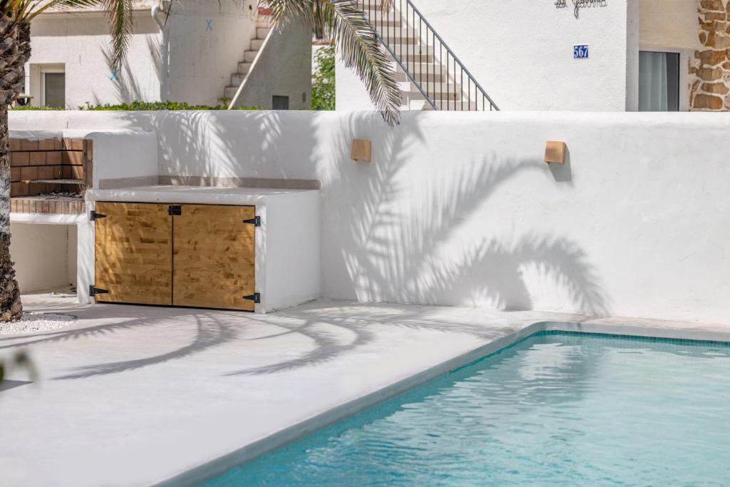 Bazén v ubytování Urbanización El Oasis, 20 Villas en 1ª Línea Playa nebo v jeho okolí