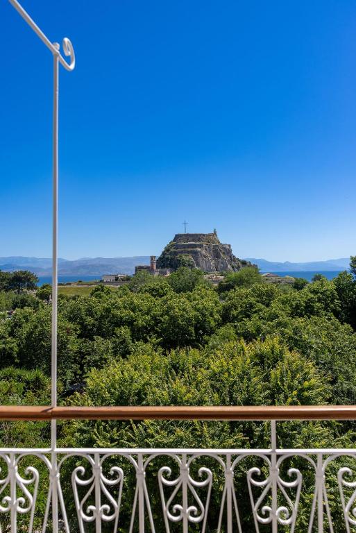a view of the temple of teotihuacan from a balcony at The Elite Corfu Luxury Apartment in Corfu