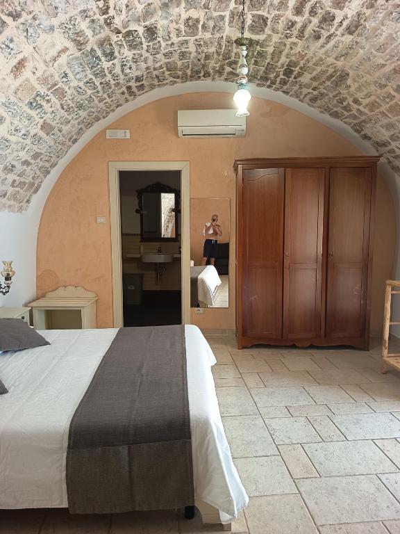 Postel nebo postele na pokoji v ubytování B&B Il Mulino del Monastero