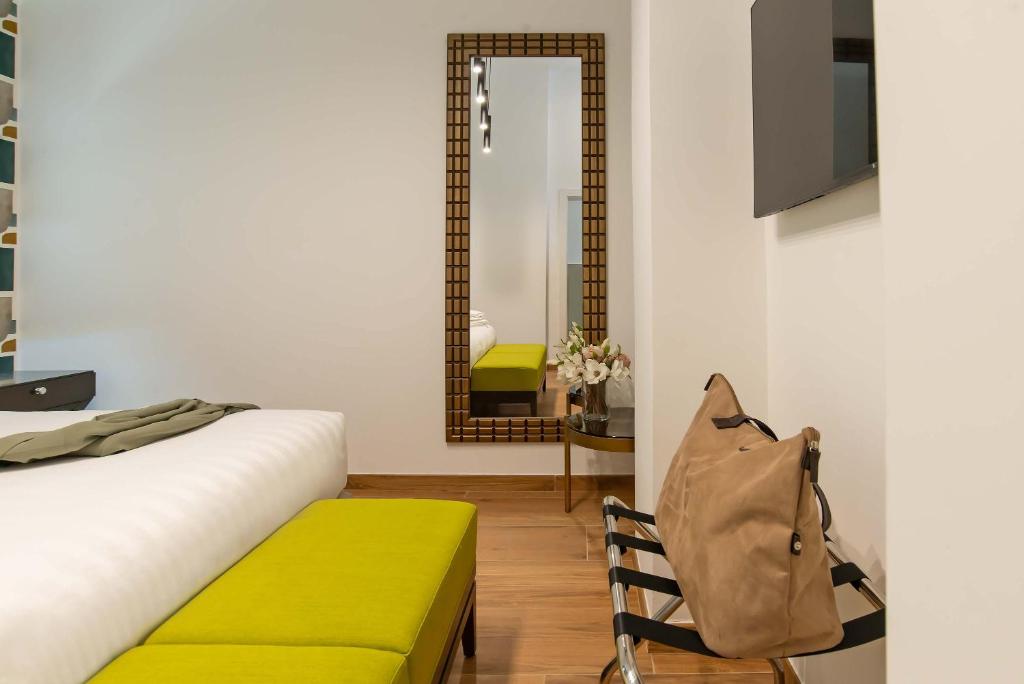 TV a/nebo společenská místnost v ubytování Essence Collection Hotel