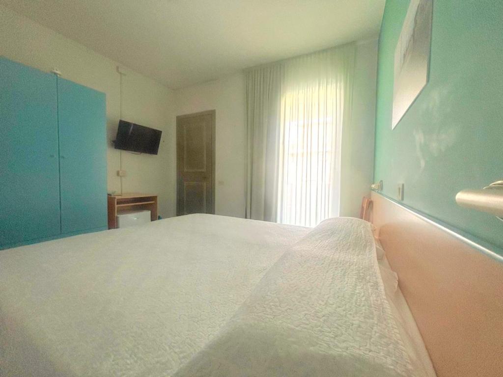 Postel nebo postele na pokoji v ubytování Hotel Splendor