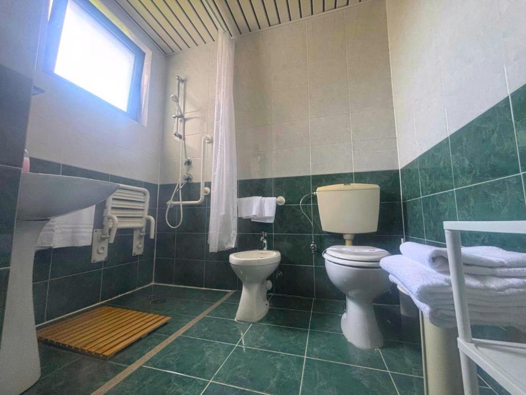 Koupelna v ubytování Hotel Splendor