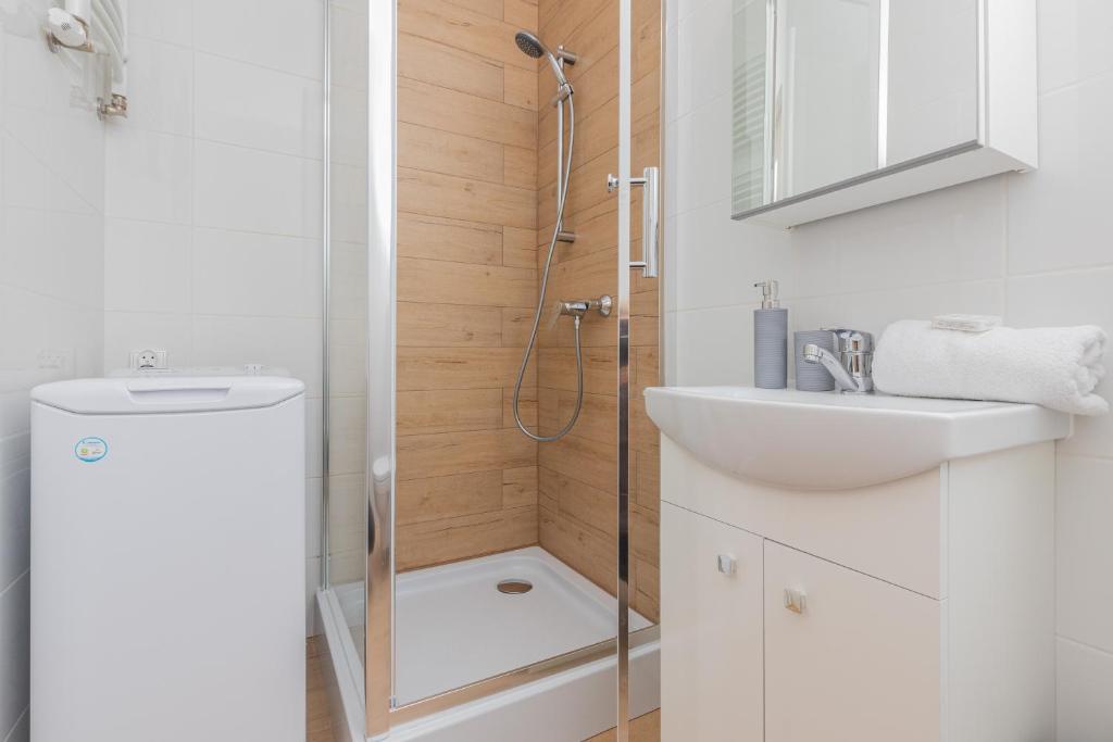 Kúpeľňa v ubytovaní Seaside & Park Apartments Gdańsk by Noclegi Renters
