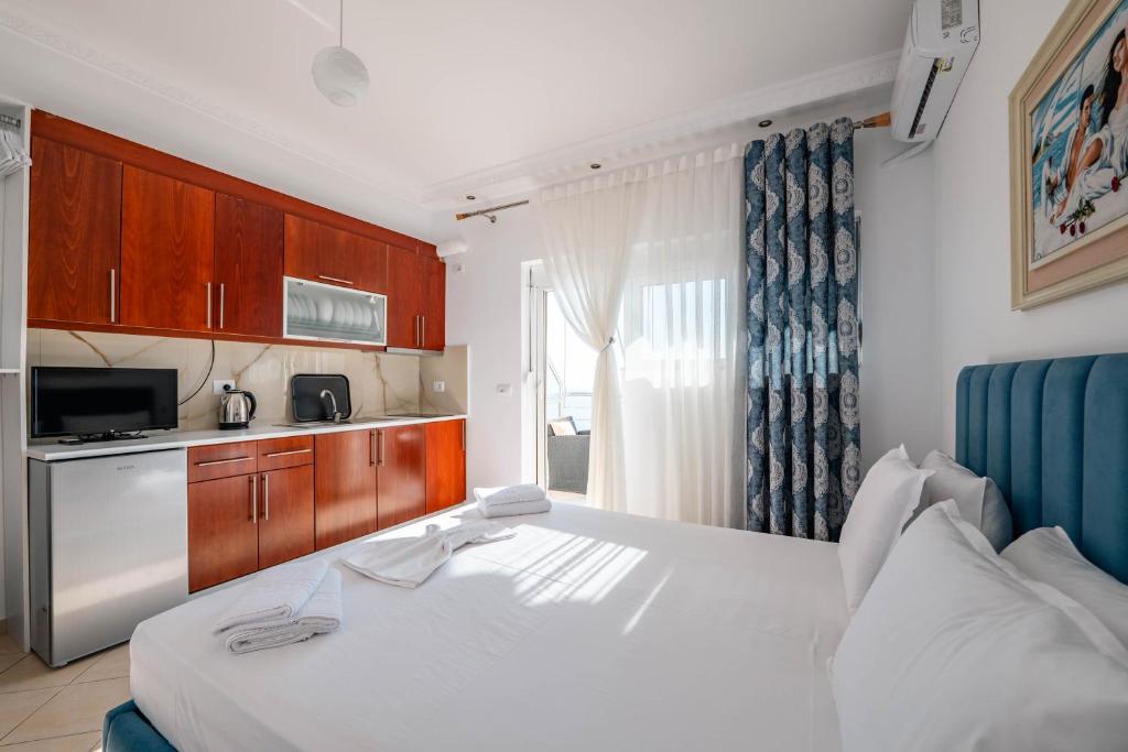 Postel nebo postele na pokoji v ubytování Eleni Guest House