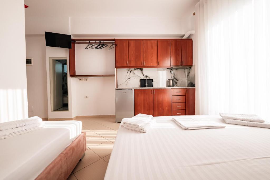 Postel nebo postele na pokoji v ubytování Eleni Guest House