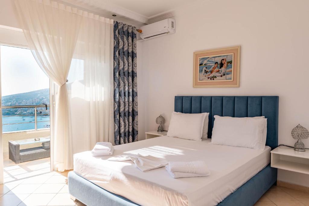 Postel nebo postele na pokoji v ubytování Eleni Guest House