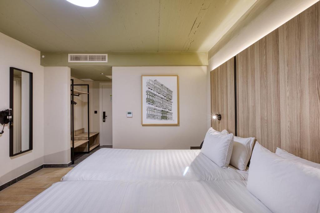 Postel nebo postele na pokoji v ubytování VITA Hotel