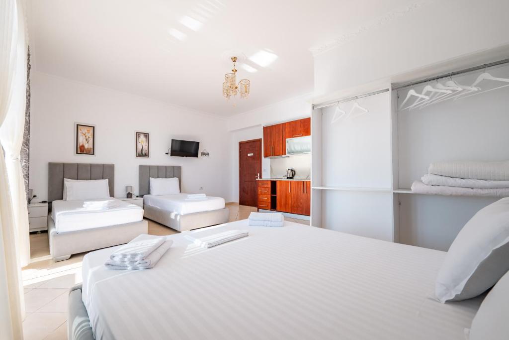 Postel nebo postele na pokoji v ubytování Eleni Guest House