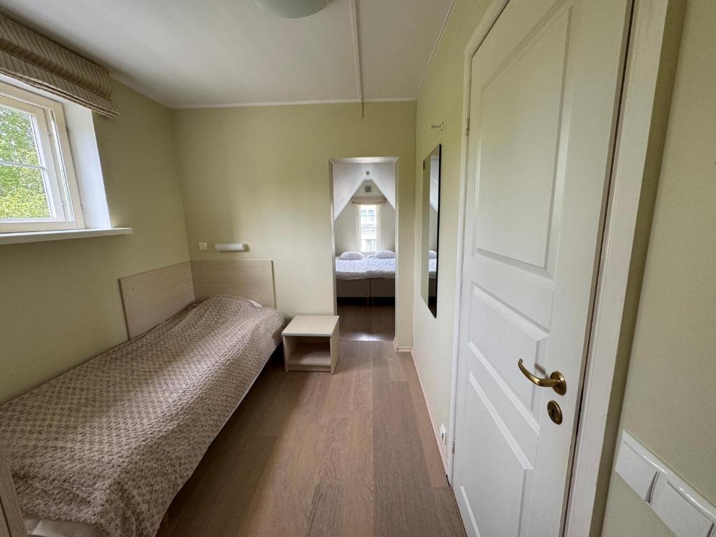 Postel nebo postele na pokoji v ubytování Inge Villa Apartment Hotel