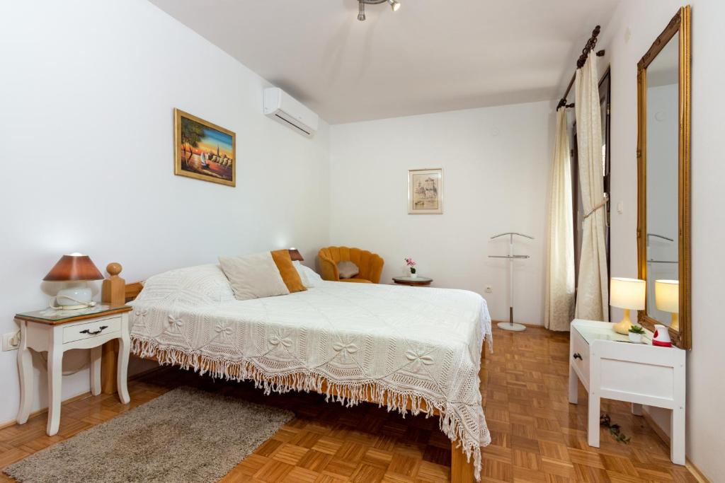 Posteľ alebo postele v izbe v ubytovaní Apartments Cordis