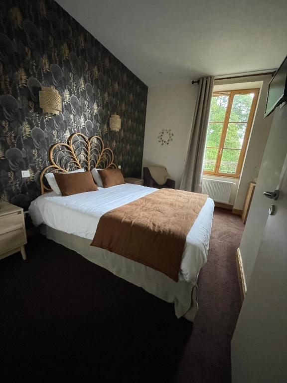 Postel nebo postele na pokoji v ubytování Auberge Côté Rivière