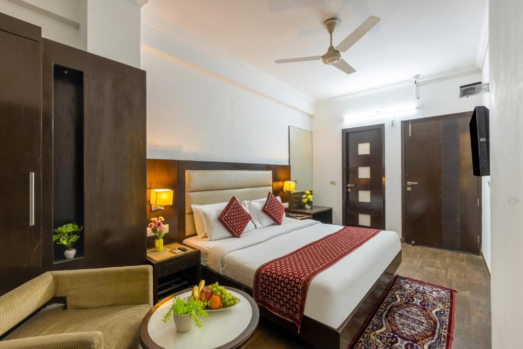 Postel nebo postele na pokoji v ubytování Chanchal Continental # Near to New Delhi Station # Family Hotel # Customer's Choice Hotel # Budget Friendly Hotel