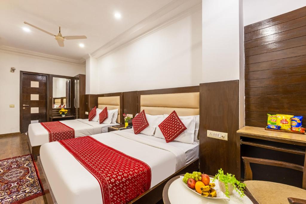 Postel nebo postele na pokoji v ubytování Chanchal Continental # Near to New Delhi Station # Family Hotel # Customer's Choice Hotel # Budget Friendly Hotel