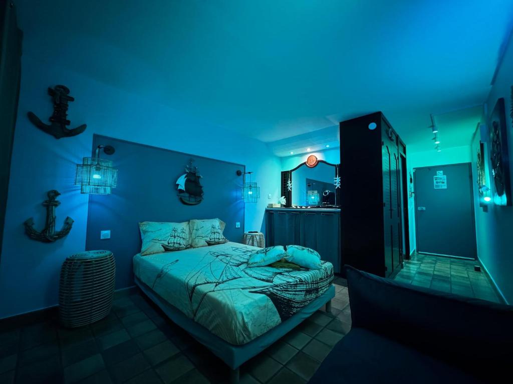Postel nebo postele na pokoji v ubytování La Caravelle - Studio Lumineux Évasion en Bord de Mer