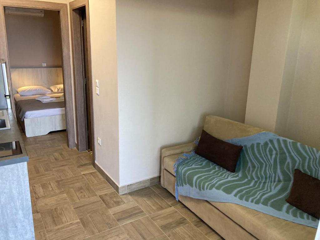 Postel nebo postele na pokoji v ubytování Thealos Rooms