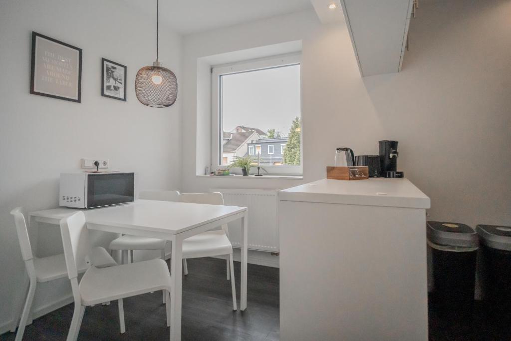 Kuchyň nebo kuchyňský kout v ubytování Juno Living - Witten Apartmenthaus