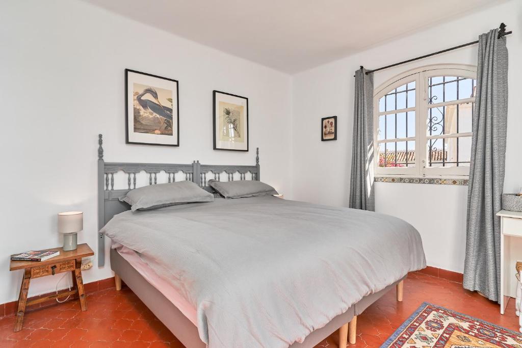 Postel nebo postele na pokoji v ubytování Capistrano Village, Casa Halo Nerja