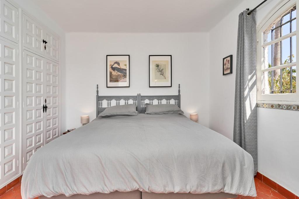 Postel nebo postele na pokoji v ubytování Capistrano Village, Casa Halo Nerja