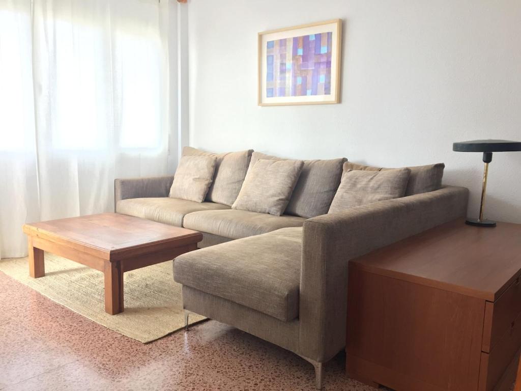 Et opholdsområde på Apartamento con vistas al mar