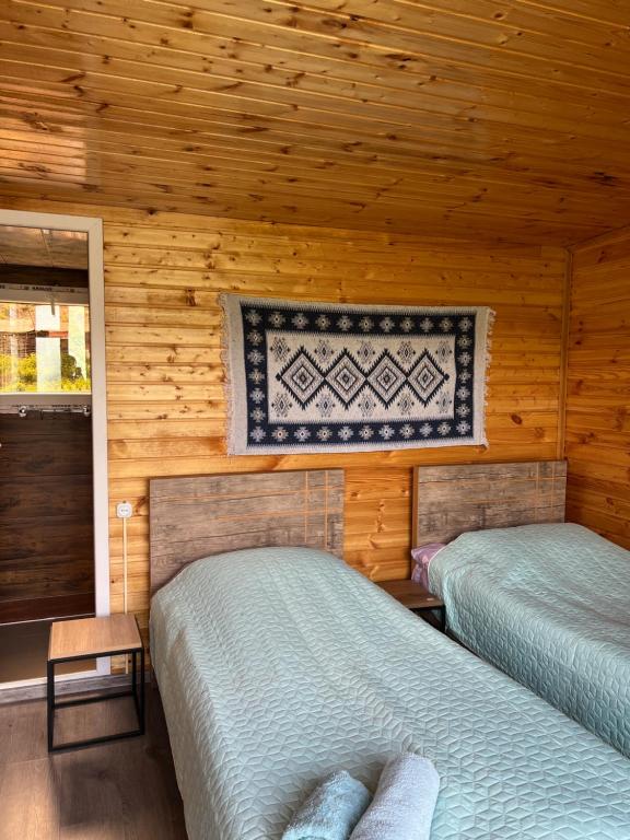 Postel nebo postele na pokoji v ubytování Ardoti Guest House