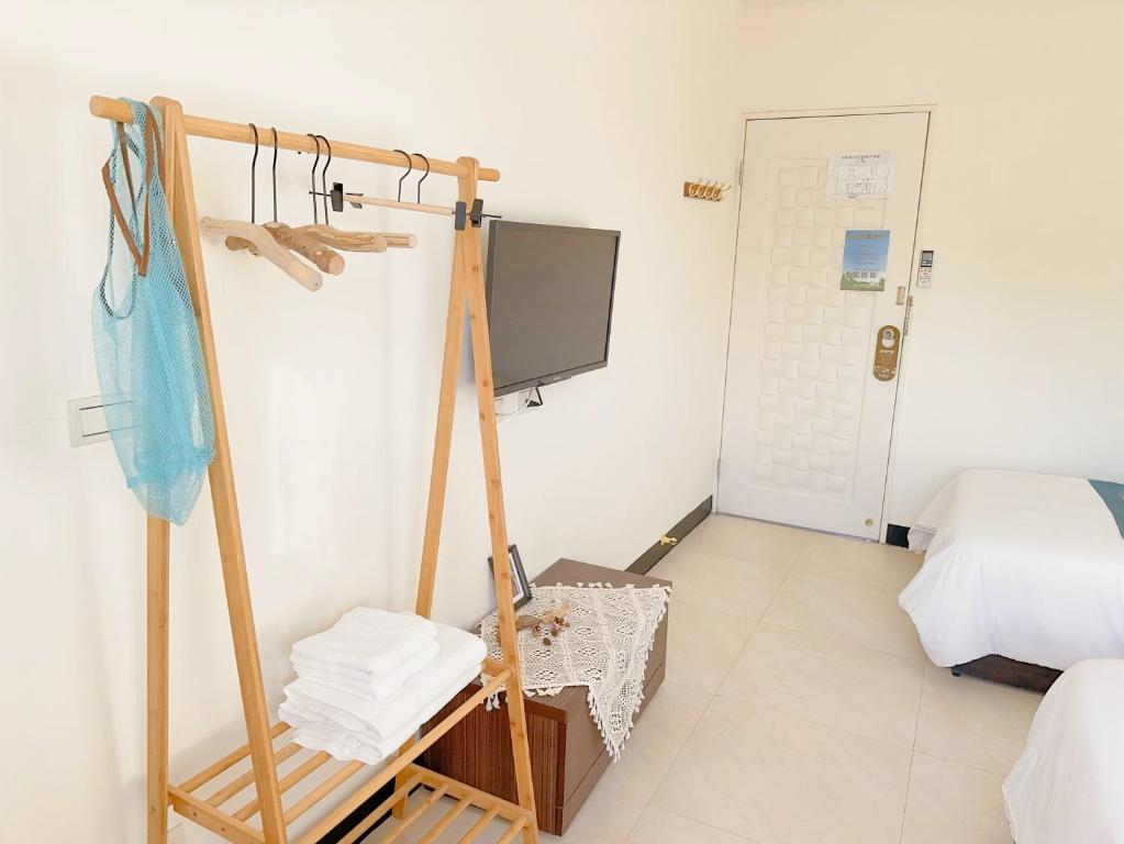 Postel nebo postele na pokoji v ubytování Jin Dun Yuan
