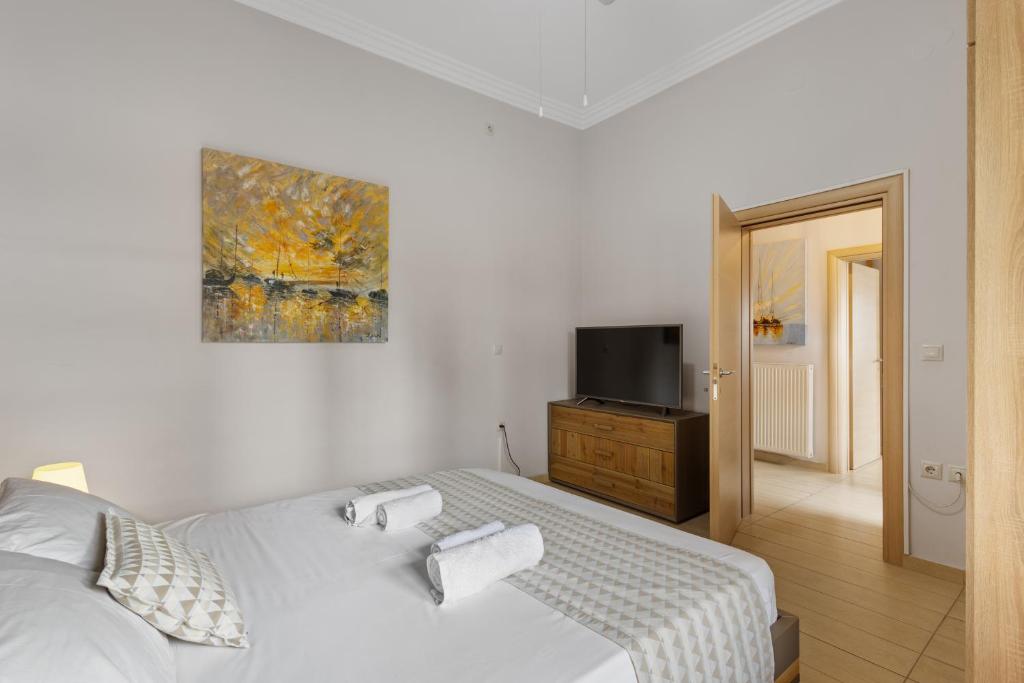 A bed or beds in a room at Casa Veranda - 3 Bedroom House with BBQ & Backyard