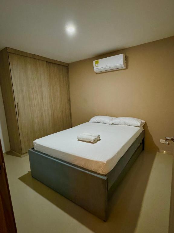 Postel nebo postele na pokoji v ubytování Moderno apartamento en Barranquilla