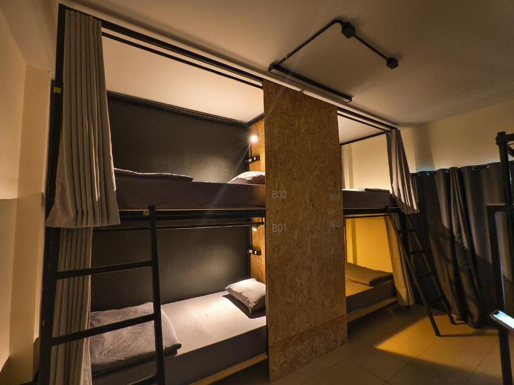 Postel nebo postele na pokoji v ubytování TIMN Hostel Female Only