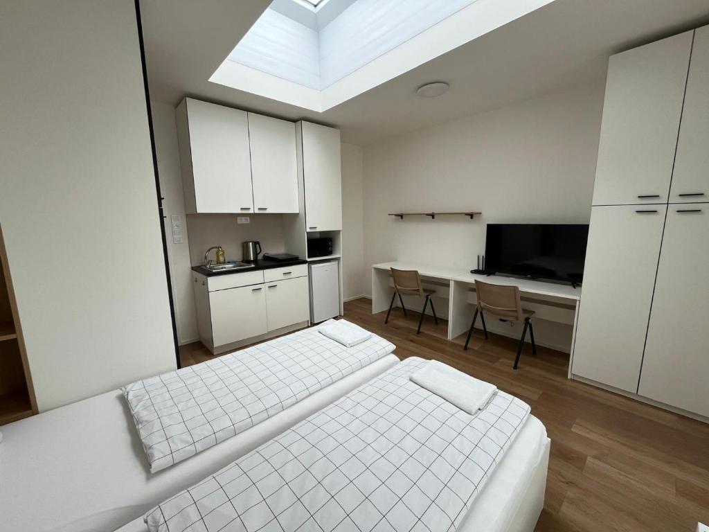 Kuchyň nebo kuchyňský kout v ubytování Bella Apartments Brno