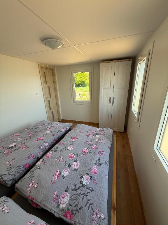 Postel nebo postele na pokoji v ubytování Penzion - Apartman Přestavlky