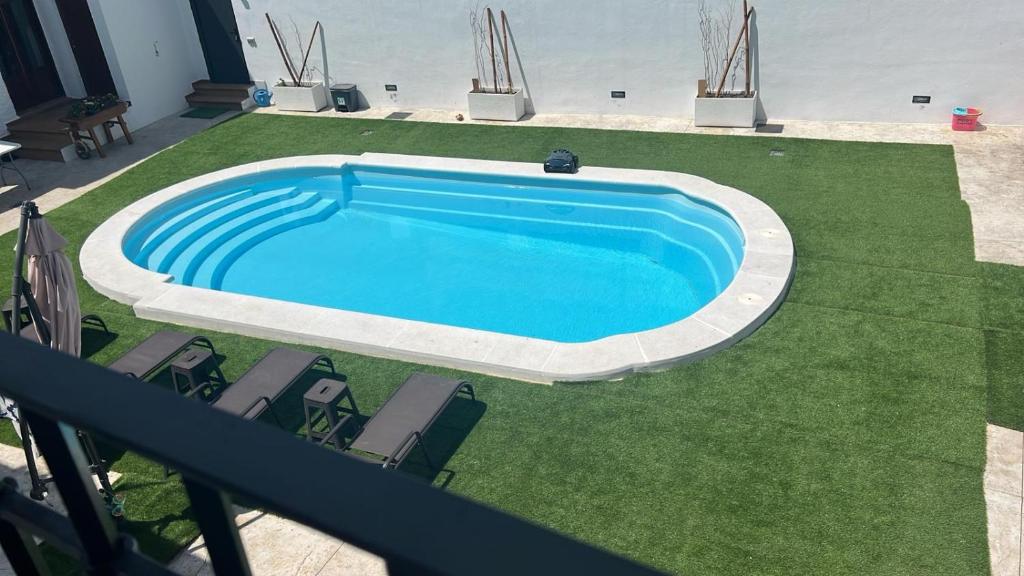Πισίνα στο ή κοντά στο Nuestro Refugio Rural