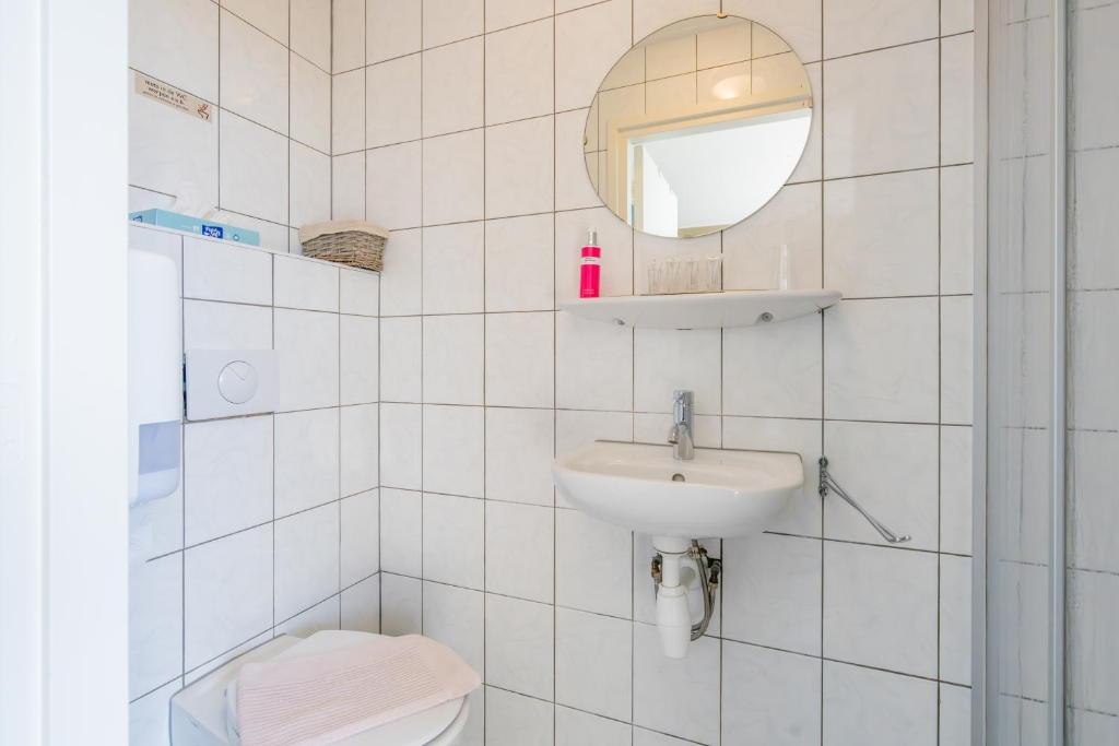 Koupelna v ubytování B&B Plompetorenzicht