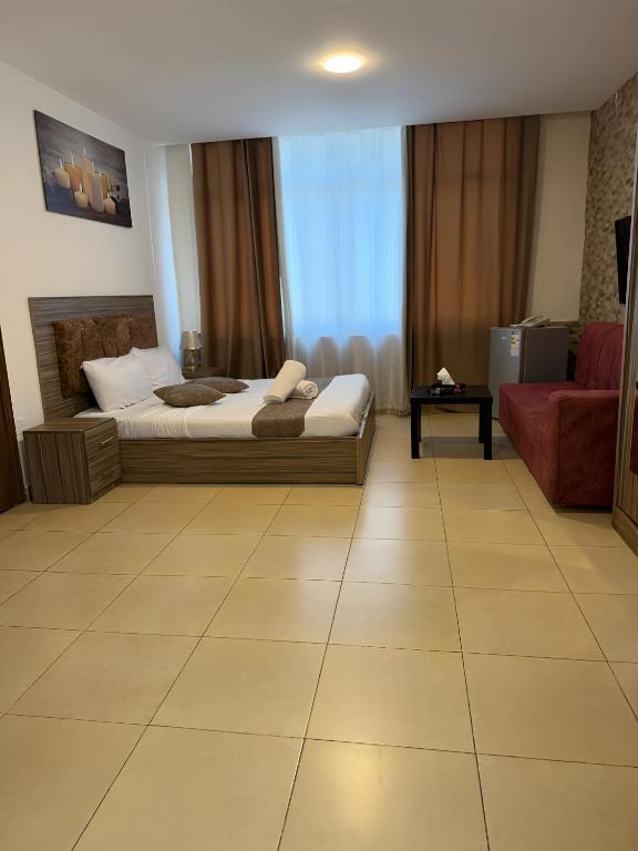 Posezení v ubytování Ryan Hotel Suites