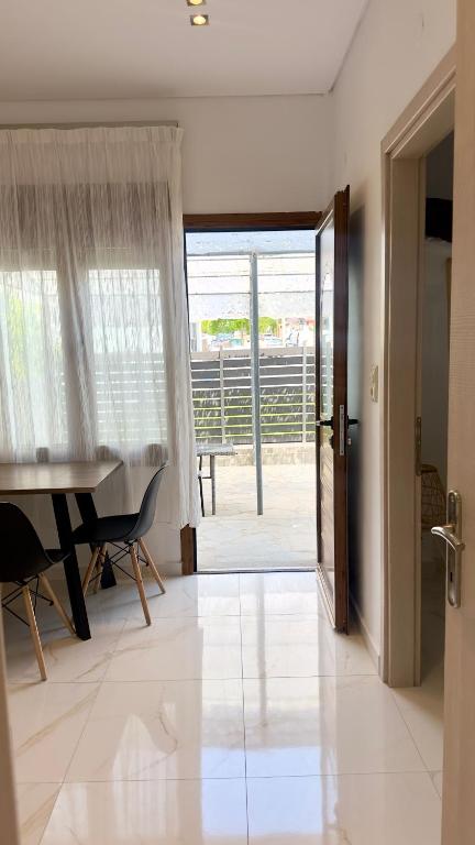 TV a/nebo společenská místnost v ubytování MaK Apartments