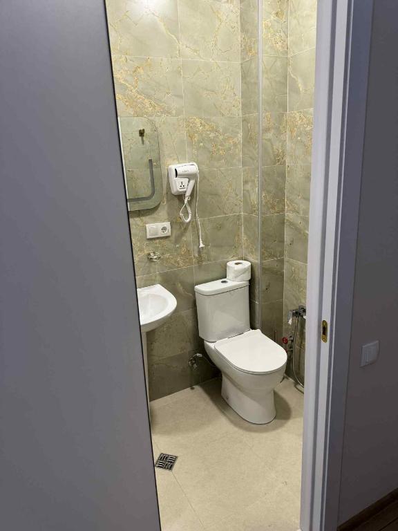 Koupelna v ubytování Hotel Caucasus