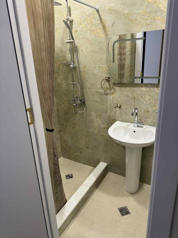 Koupelna v ubytování Hotel Caucasus