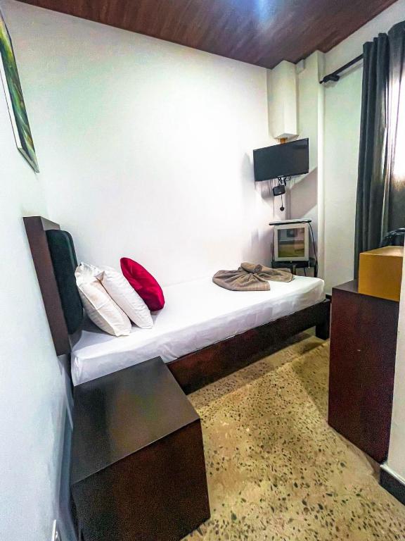 Postel nebo postele na pokoji v ubytování Hotel 198 Negombo