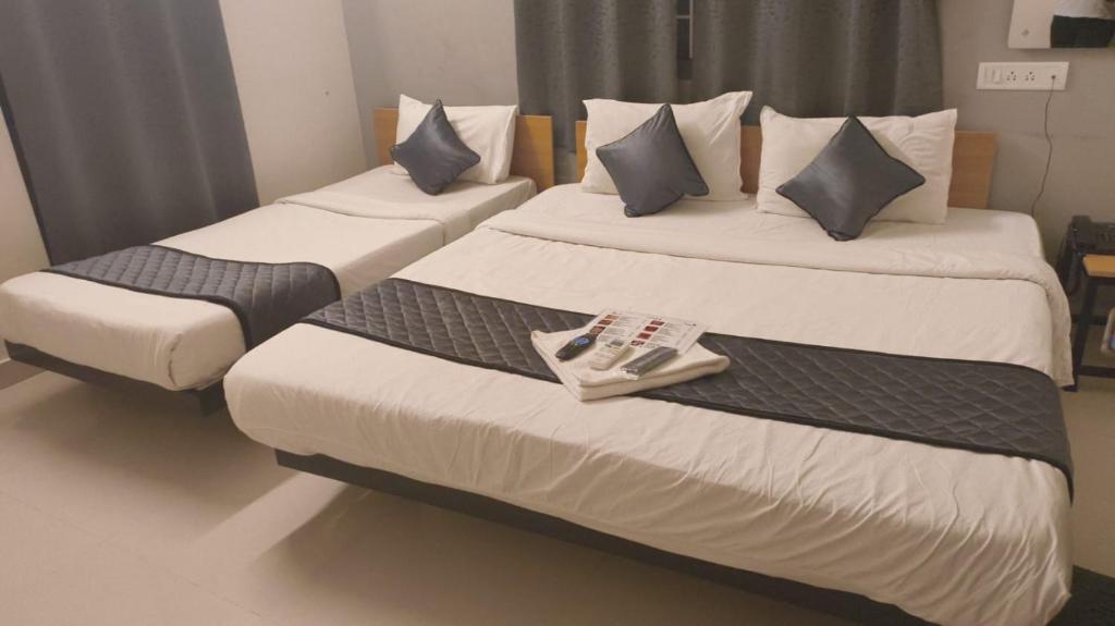 Postel nebo postele na pokoji v ubytování Inn34 By Blessings Hospitality