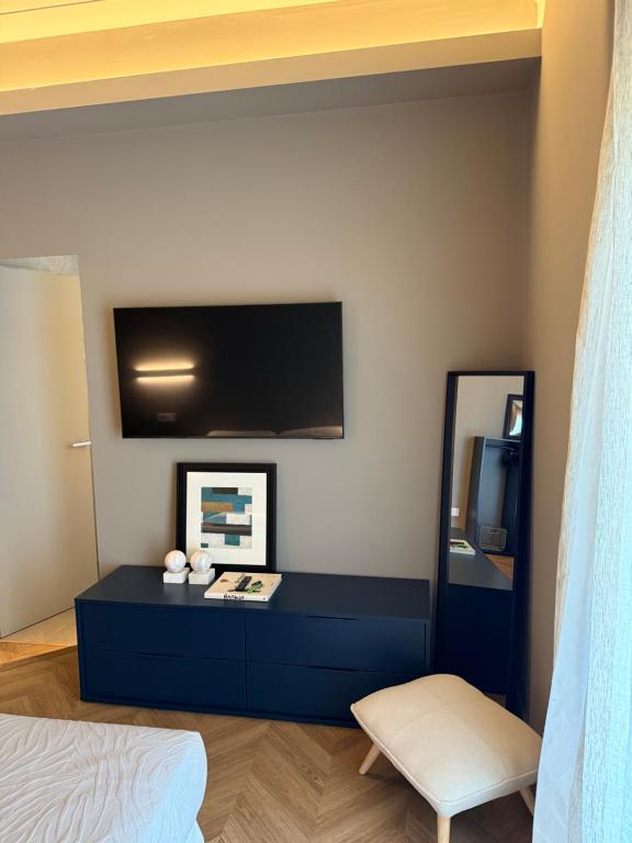 TV a/nebo společenská místnost v ubytování Four Rooms Catania