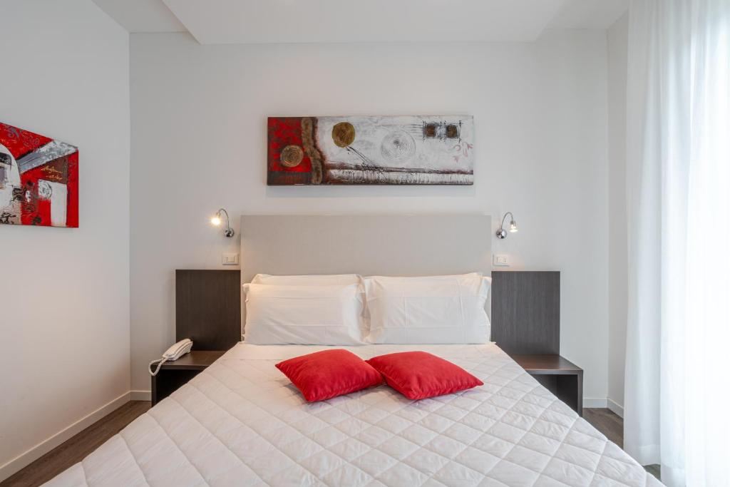 Postel nebo postele na pokoji v ubytování Hotel Mayer