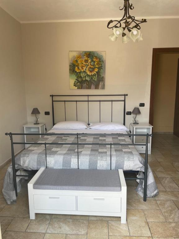 Postel nebo postele na pokoji v ubytování Agriturismo Cascina Anrì