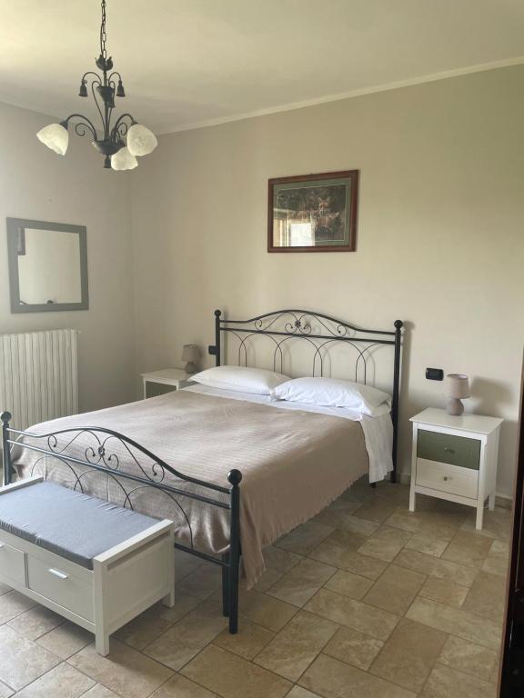 Postel nebo postele na pokoji v ubytování Agriturismo Cascina Anrì
