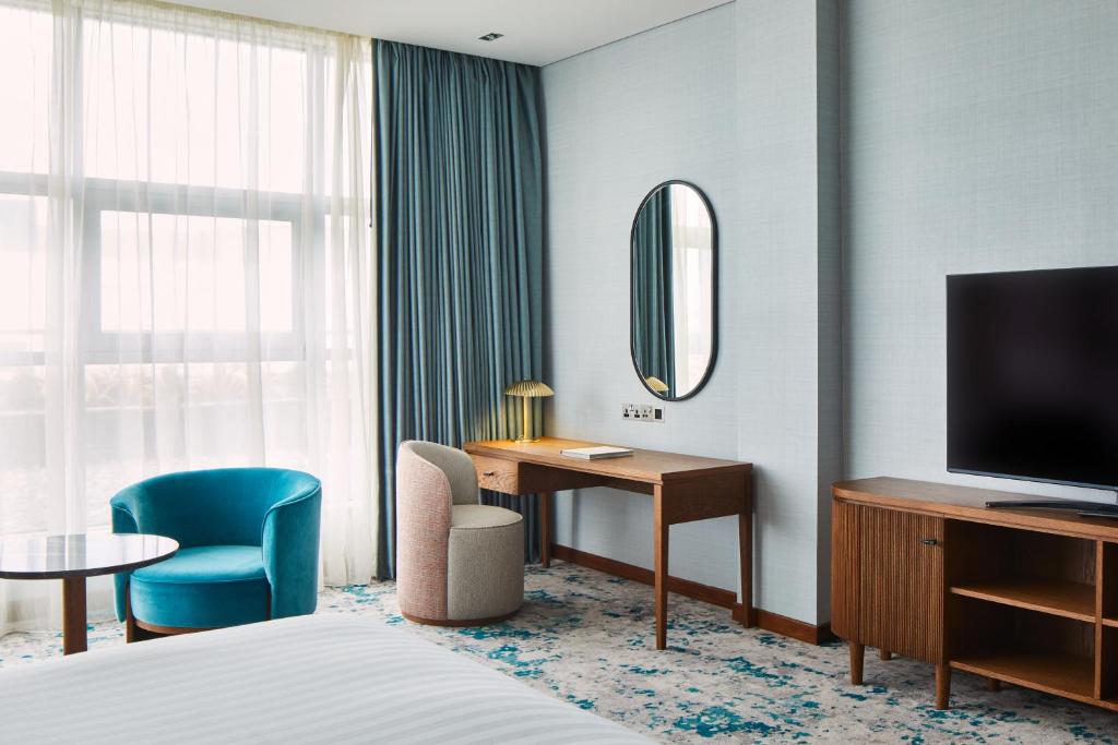 TV a/nebo společenská místnost v ubytování The g Hotel & Spa