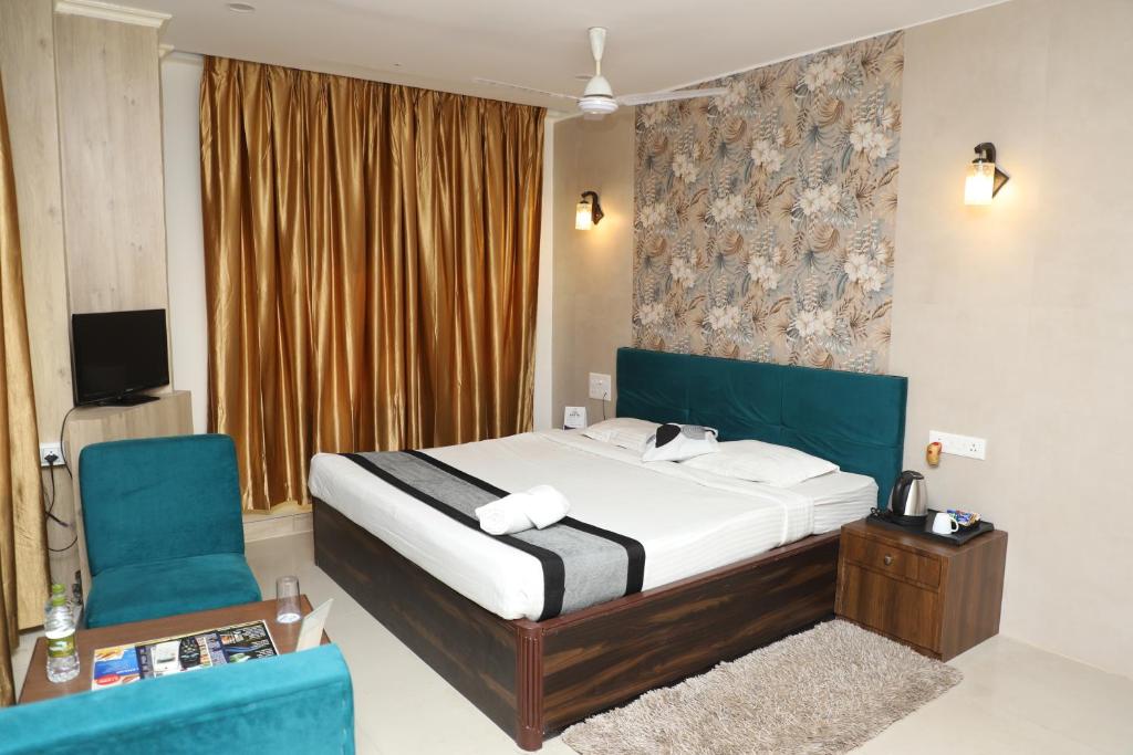 Postel nebo postele na pokoji v ubytování The Blue Lagoon Hotel Premium