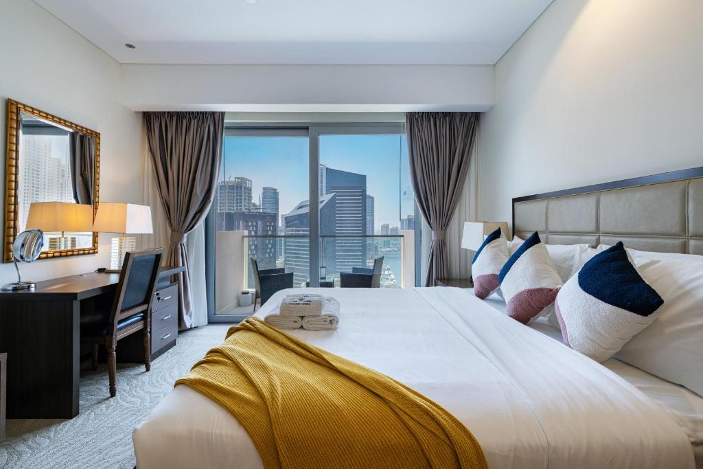 Postel nebo postele na pokoji v ubytování Luxury Address Res DubaiMarina Studio3 Frank&Frank - 1910
