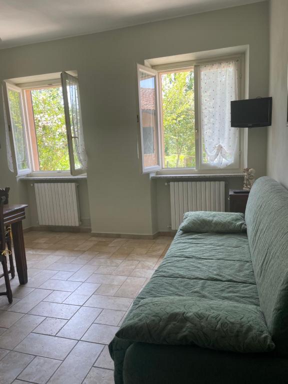 Postel nebo postele na pokoji v ubytování Agriturismo Cascina Anrì