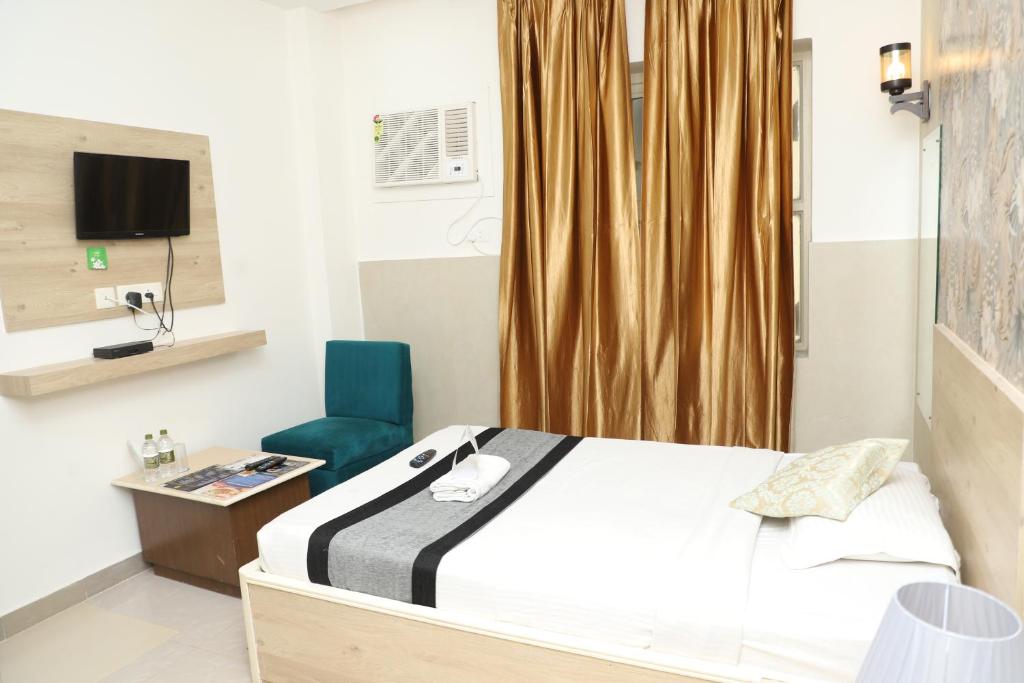 Postel nebo postele na pokoji v ubytování The Blue Lagoon Hotel Premium