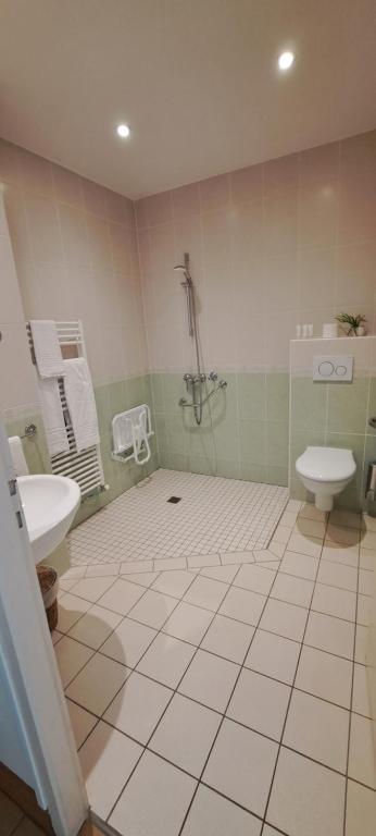 Koupelna v ubytování Auberge Côté Rivière